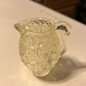 Vintage pressed glass miniature pitcher  or can be used as a tooth pick holder